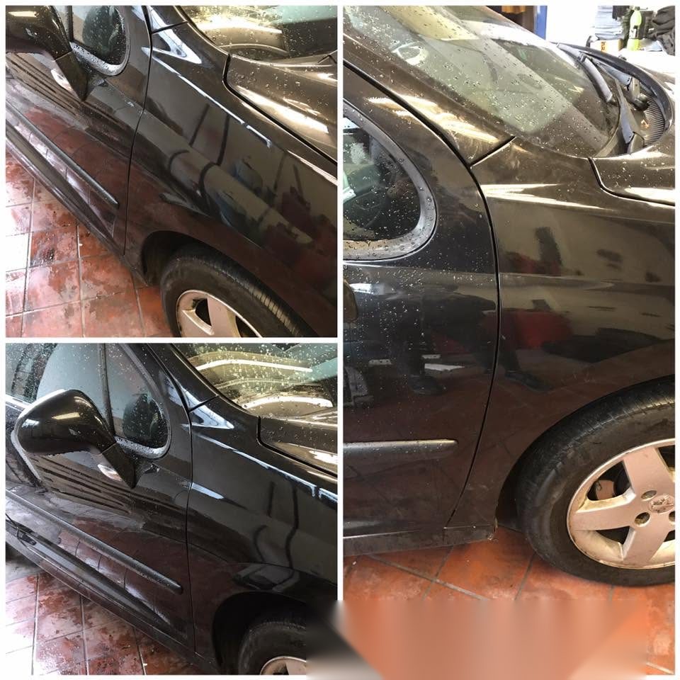 The same black Peugeot after panel repair and respray, with the door and wing straight and the paint matched